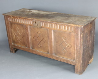 An 18th Century elm coffer of panelled construction with hinged lid and faux iron lock to the front and arcaded decoration 68cm h x 133cm w x 48cm d 