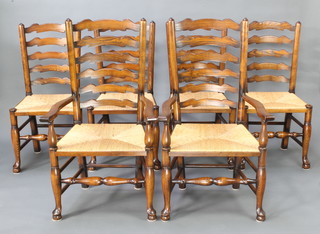 A set of six elm ladder back dining chairs with woven rush seats, raised on club supports 