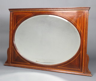 An Edwardian oval bevelled plate over mantel mirror contained in an inlaid mahogany frame 83.5cm h x 128cm w 