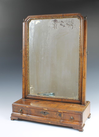 A Queen Anne style rectangular plate dressing table mirror contained in a walnut swing frame, the base fitted 1 long drawer flanked by 2 short drawers with ogee bracket feet 69cm h x 47cm w x 22cm d 