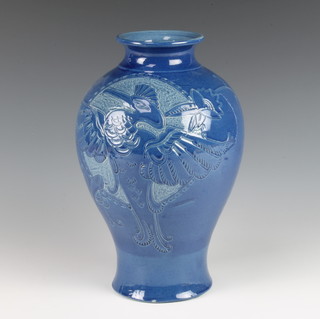 A Brannam Barnum blue glazed oviform vase decorated with a stylised bird 29cm 