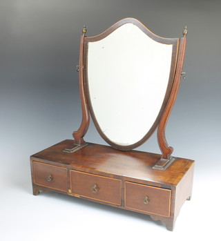 A Sheraton style shield shaped dressing table mirror contained in a mahogany frame, raised on a rectangular base fitted 1 long and 2 short drawers 54cm h x 46cm w x 20cm d 