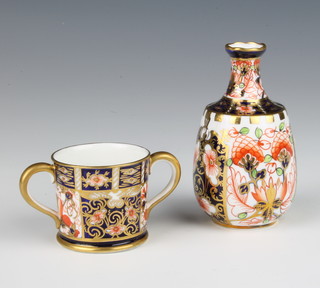 A Royal Crown Derby Imari pattern baluster vase 8cm and a 2 handled cup 4cm 