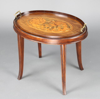 An Edwardian oval inlaid mahogany twin handled tea tray the centre inlaid floral decoration, raised on a later associated base 50cm h x 59cm w x 40cm d 