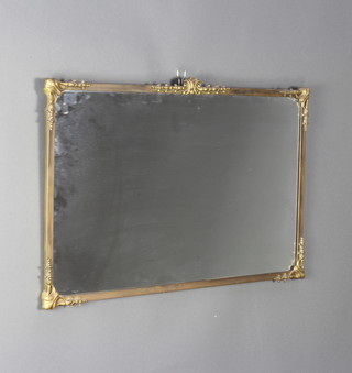 An Art Deco rectangular plate mirror contained in a decorative gilt frame 46cm x 74cm 