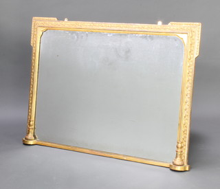 A 19th Century rectangular plate over mantel mirror contained in a decorative gilt frame 80cm x 110cm 