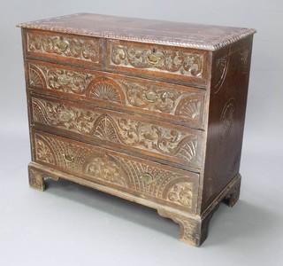 A George III carved oak chest of 2 short and 3 long drawers with brass swan neck drop handles, raised on bracket feet, heavily carved throughout 95cm h x 110cm w x 55cm d 