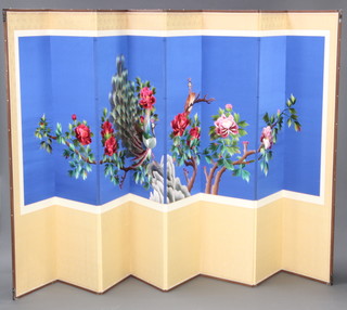 A Chinese 8 fold double sided screen with blue ground embroidered birds amidst branches, the reverse with text 190cm h x 364cm when open 