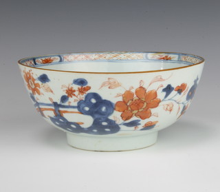 An 18th Century Chinese Imari bowl decorated with a garden view 17cm diam. 