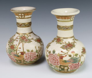 A pair of 20th Century Japanese baluster crackle glazed vases decorated with birds amongst flowers 19cm h 