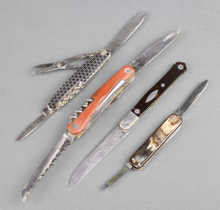 A Swiss Wenger multi blade knife with composition grip, a Swiss 2 bladed, scissor and corkscrew knife with enamelled grip stamped Wenger, a small lobster pen knife with horn grip stamped Riethmuller Zurich and a single bladed French knife stamped Guerrect Duroi Alangres 