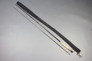 A Regent HS carbon 9 1/2ft carbon fishing rod with 7/8 lines in original bag 
