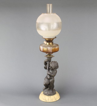A Victorian faceted glass oil lamp reservoir raised on a spelter and marble base in the form of a standing cherub with clear glass chimney and etched glass shade 81cm x 19cm  