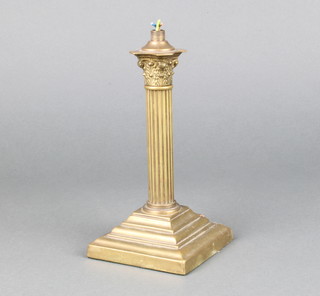 A brass reeded column table lamp with Corinthian capital raised on a stepped base 18cm x 9cm x 9.5cm 