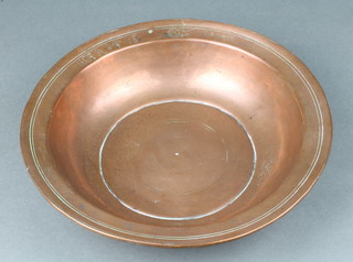 A 17th/18th Century "Persian" copper bowl, the rim with inscription 6cm h x 27cm  diam. 