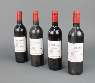 Four bottles of 1996 Chateau Lagrange Pomerol 