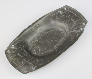 A Liberty's Art Nouveau boat shaped English pewter dish with stylised leaf decoration, the base marked 7 Made in England English Pewter 0547 22cm l x 12cm w
