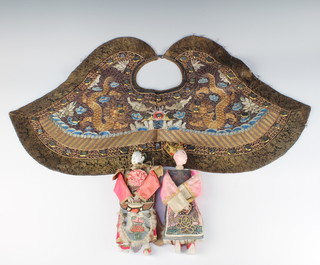 A pair of Chinese costume dolls together with a Chinese arched shaped embroidered collar 39cm x 80cm 