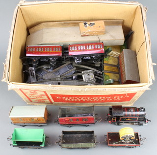 A Hornby O gauge type 40 clockwork tank engine and various items of rolling stock and track etc 