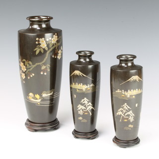 A pair of Japanese bronze vases decorated Mount Fuji 15cm together with 1 other decorated ducks 21cm 