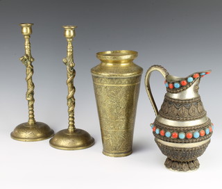 A Tibetan gilt metal jug set cabochon polished stones 22cm, a Benares brass waisted vase 22cm x 10cm, together with 2 brass candlesticks decorated dragons 28cm x 11cm 