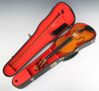 Of Dorking interest, Frederick Weller, a violin with 35cm back complete with bow, labelled Frederick Weller Dorking Surrey no.109 contained in a fibre case 