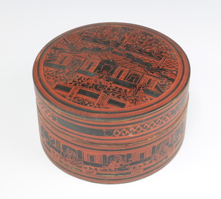 A Chinese cylindrical red lacquered jar and cover the interior fitted a tray 10cm x 18cm diam. 