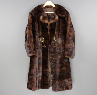 A lady's full length dark mink fur coat (slight split to arm area and moulting) 
