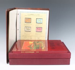 Two albums of Chinese mint presentation stamps, an album of 1990 Chinese stamps and 1 other album of Chinese stamps 