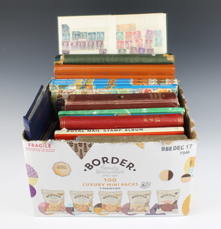 Eleven albums of mint and used world stamps together with 5 stock books 