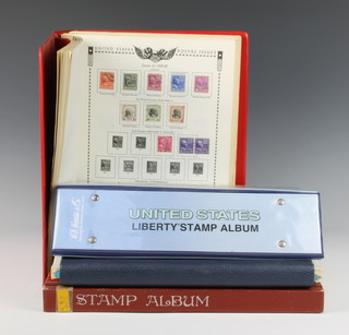 The All American stamp album of mint and used American stamps 1851-1977, The Liberty stamp album of used and mint American stamps 1894-1991, an album of mint and used American stamps and a stock book do. 