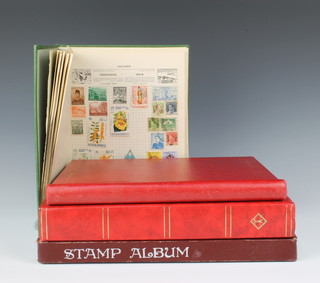 A Swift album of mint and used world stamps - Cayman Islands, Egypt, Greece, Nigeria, etc, an album of used Ugandan, Ukraine United Nation stamps together with 2 stock books of used world stamps 