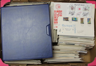 Two boxes containing a large collection of GB first day covers and albums