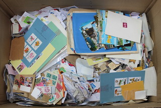 A large collection of loose stamps and first day covers 