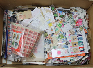 A large collection of loose GB and world stamps