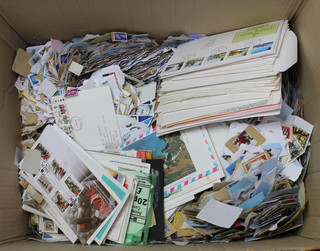 A large collection of loose GB and world stamps and first day covers 