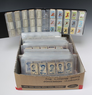 An album of British Automatic Company weighing machine cards, cigarette cards including Players, Cravens, Murrays, Wills, Melachrino, Gallaghers, Churchmans, Geoffrey Philips  
