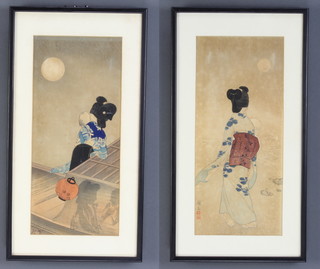 A pair of Japanese woodblock prints, studies of geishas, signed 36cm x 16cm  