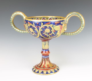 A Gualdo Tadino 2 handled lustre cup with serpent handles and masks decorated with scrolls 26cm 