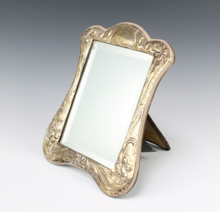 An Art Nouveau style silver photograph frame decorated with flowers and vacant cartouche 30cm 