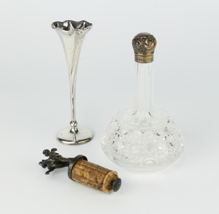 A tapered silver posy vase 13cm with rubbed marks, a mounted bottle and a bottle stopper 