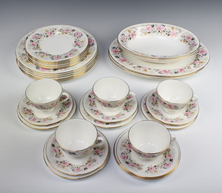A Royal Trent part tea and coffee set comprising 5 tea cups, 5 saucers, 6 small plates, 6 medium plates, 6 dinner plates, 2 meat plates and 2 serving dishes 