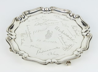 A silver card tray with pie crust rim engraved with signatures and armorial Sheffield 1936, 330 grams, 21.5 cm 