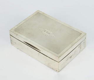 A silver Art Deco rectangular cigarette case with engine turned decoration Birmingham 1931, 13cm 