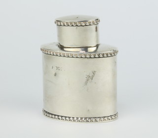 A silver oval tea caddy with gadroon edges, London 1911, 129 grams