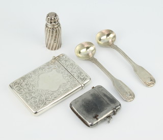 A silver card case with chased decoration London 1913, a silver mounted scent bottle, 2 mustard spoons and a vesta 