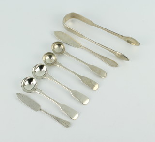 A pair of Victorian silver nips London 1850, 2 butter knives and 4 mustard spoons 150 grams 