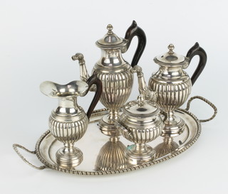 An 800 standard 4 piece tea set with fluted bodies and serpent spouts with ebony mounts on a 2 handled oval tray, 1418 grams