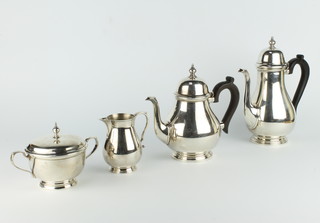 A Tiffany & Co sterling silver 4 piece Queen Anne style tea and coffee set with ebony mounts, gross 2266 grams 