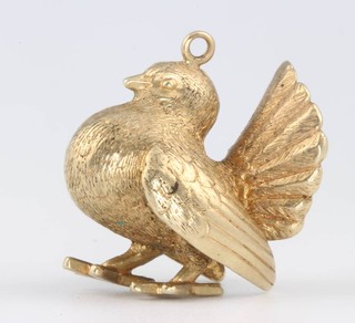 A 9ct yellow gold bird charm 8.9 grams